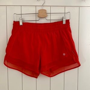 Athleta athletic shorts red, size small